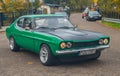 Classic elegant green old Ford Capri driving