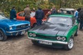 Classic elegant green old Ford Capri parked