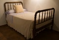 Classic Bed in rural ambient. Royalty Free Stock Photo