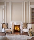 Classic beige interior with fireplace, armchairs, moldings, wall pannel, carpet, fur.