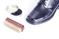 Classic black men's shoe, boot polish and brush