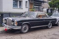 Classic black Mercedes Benz car parked