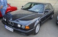 Classic black sedan BMW E32 Royalty Free Stock Photo