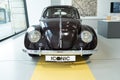 classic black vintage car Volkswagen VW Beetle pretzel, automotive nostalgia 1950s, display Iconic show Volkswagen Group Forum in