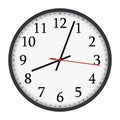 Classic black and white round wall clock on white background.