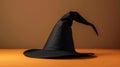 Classic black witch hat on an orange background Royalty Free Stock Photo