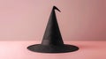 Classic black witch hat on a pink background Royalty Free Stock Photo