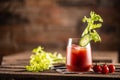 Classic bloody mary or virgin mary vodka cocktail in a cup with as a hangover drink in a rustic envrionment Royalty Free Stock Photo