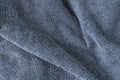 Classic blue background texture of Terry towel fabric, wavy folds Royalty Free Stock Photo