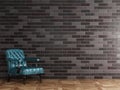 Classic blue brown leather armchair standing in front of black brick wall with copy space Royalty Free Stock Photo