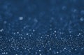 Classic Blue color. Color of the year 2020. Abstract festive bokeh background with shining defocus sparkles. Blurred glitters Royalty Free Stock Photo