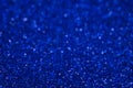 Classic Blue color. Color of the year 2020. Abstract festive bokeh background with shining defocus sparkles. Blurred glitters Royalty Free Stock Photo