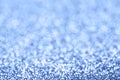 Classic blue confetti and stars and sparkles on blue background Royalty Free Stock Photo