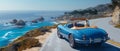 Classic blue convertible cruising along a scenic coastal road with ocean views