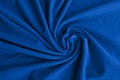Classic blue delicate fabric draped and spun. Close-up
