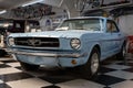 classic blue Ford Mustang from 1965 first generation