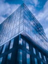 Classic blue glass office futuristic building in the city centre till the sky Royalty Free Stock Photo