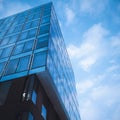 Classic blue glass office futuristic building in the city centre till the sky Royalty Free Stock Photo