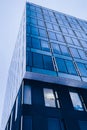 Classic blue glass office futuristic building in the city centre till the sky Royalty Free Stock Photo