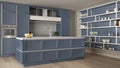 Classic blue kitchen in modern open space with parquet floor and big shelving system with decors, island and accessories, Royalty Free Stock Photo