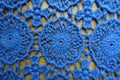 Classic blue lacy fabric on wood