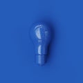 Classic Blue Light bulb Color on blue background. Top view. 3D Render Royalty Free Stock Photo