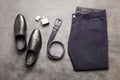 Classic blue men`s trousers with black leather shoes and a belt Royalty Free Stock Photo