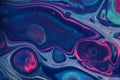 Dark classic blue and glitter teal are outlined in neon pink in this abstract acrylic painting for backgrounds.