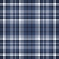 Classic blue plaid pattern. Seamless fabric texture with intersecting lines, creating a timeless aesthetic. Great for backgrounds Royalty Free Stock Photo