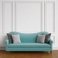 Classic blue sofa with grey pillows standing in classic interior. Royalty Free Stock Photo