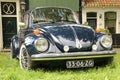 Classic blue volkswagen beetle Royalty Free Stock Photo