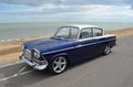 Classic Blue and White HumberSceptre on seafront promenade beach and sea in background Royalty Free Stock Photo