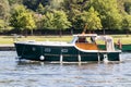 Classic boat cruising on the River Thames