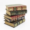 Classic books stacked against white background Royalty Free Stock Photo