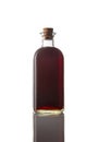 Classic bottle of red vermouth on white background. Isolated image. Vertical image