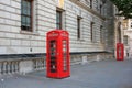 Classic british red phone booth  on old street of London, UK Royalty Free Stock Photo