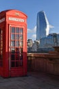 Classic British Red Telephone Booth Telephone Box in London in Sunny Weather Royalty Free Stock Photo