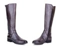 Classic brown glossy leather high knee flat heels female boots. Two isolated