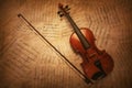 Classic Vintage violin on the sheet music. Royalty Free Stock Photo