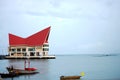 Classic building of harbour quayside and fishing boat floating sea ocean for thai people and foreign travelers travel visit and Royalty Free Stock Photo