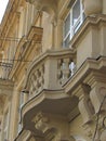 Classic buildings Lviv, fragment of classic city buildingconsole balconies curly columns