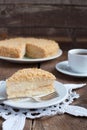 Classic Cake Napoleon of puff pastry with custard cream on a plate Royalty Free Stock Photo