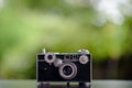 Classic camera Put on the table does not look expensive. Photography Ideas and Old Camera Care Royalty Free Stock Photo