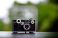 Classic camera Put on the table does not look expensive. Photography Ideas and Old Camera Care Royalty Free Stock Photo
