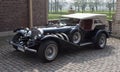 Classic car in castle courtyard Royalty Free Stock Photo