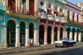 Classic car in a colorful street in downtown Havana