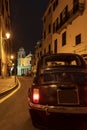 Classic car cruising on the road Royalty Free Stock Photo