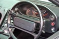 Classic car driver steering and interior dashboard.