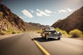 classic car driving down a sunny, scenic highway Royalty Free Stock Photo