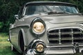 Classic car from the early fifties with large chromed grille Royalty Free Stock Photo